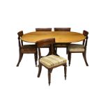 A George III mahogany tilt top breakfast table and five William IV label back dining chairs, the