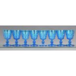 A set of eight vivid blue French moulded wine glasses approx. 12.7cm high. (8) *One glass has a