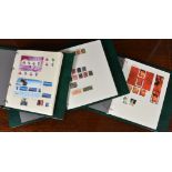 Philately interest - Three stamp binders containing stamps of Canada comprising hinged used and