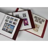 Philately interest - Stanley Gibbons / Guernsey mint stamp albums contained in three albums, from