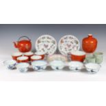 A small group of Chinese coral glazed porcelain 20th century, including a covered dish, painted with