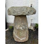 A Guernsey granite mushroom approximately 27 inches in height, plus cap of approximately 20 inches