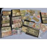 A collection of various vintage Worldwide banknotes.