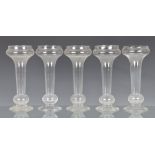 A set of five clear, blown glass hyacinth vases 20th century, 10½in. (26.8cm.) high. (5) *All in