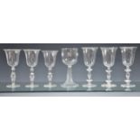 A set of six Façon De Venise style blown glass wine glasses 20th Century, comprising two matched
