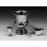A silver plated urn form wine cooler8 ¾in. (22.2cm.) high; together with a silver plated cream