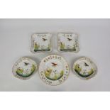 A part Naples porcelain dessert service gilded, crowned N mark, comprising eight 9in. plates, two