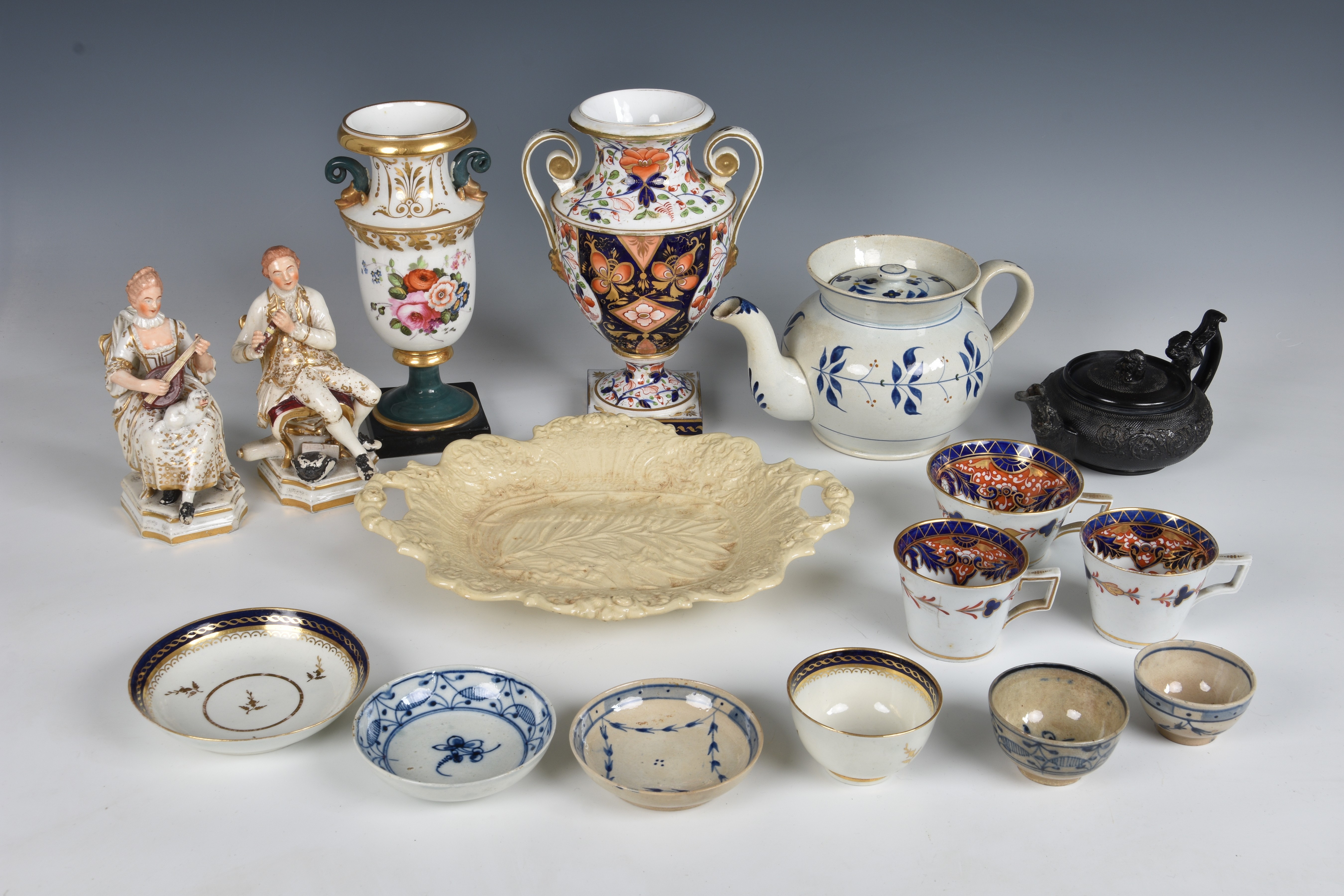 A small collection of 19th century English ceramics including a Bloor Derby two-handled urn in Imari