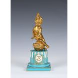 A 19th century style gilt bronze figure of a young turk mounted on a matched Sevres style