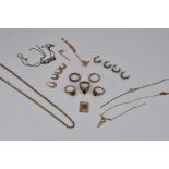 A large collection of 9ct yellow gold jewellery (mostly damaged) to include gem set rings, chains,