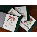 Philately interest - Four stamp binders holding Eire & Isle of Man stamps containing used and unused