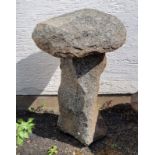 A Guernsey granite mushroom the base approximately 21 inches in height, plus cap of approximately 18