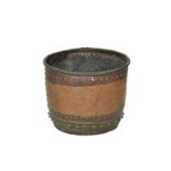 A 19th century riveted copper log or kindling bucket large old plated repair, 12in. (30.5cm.) high.