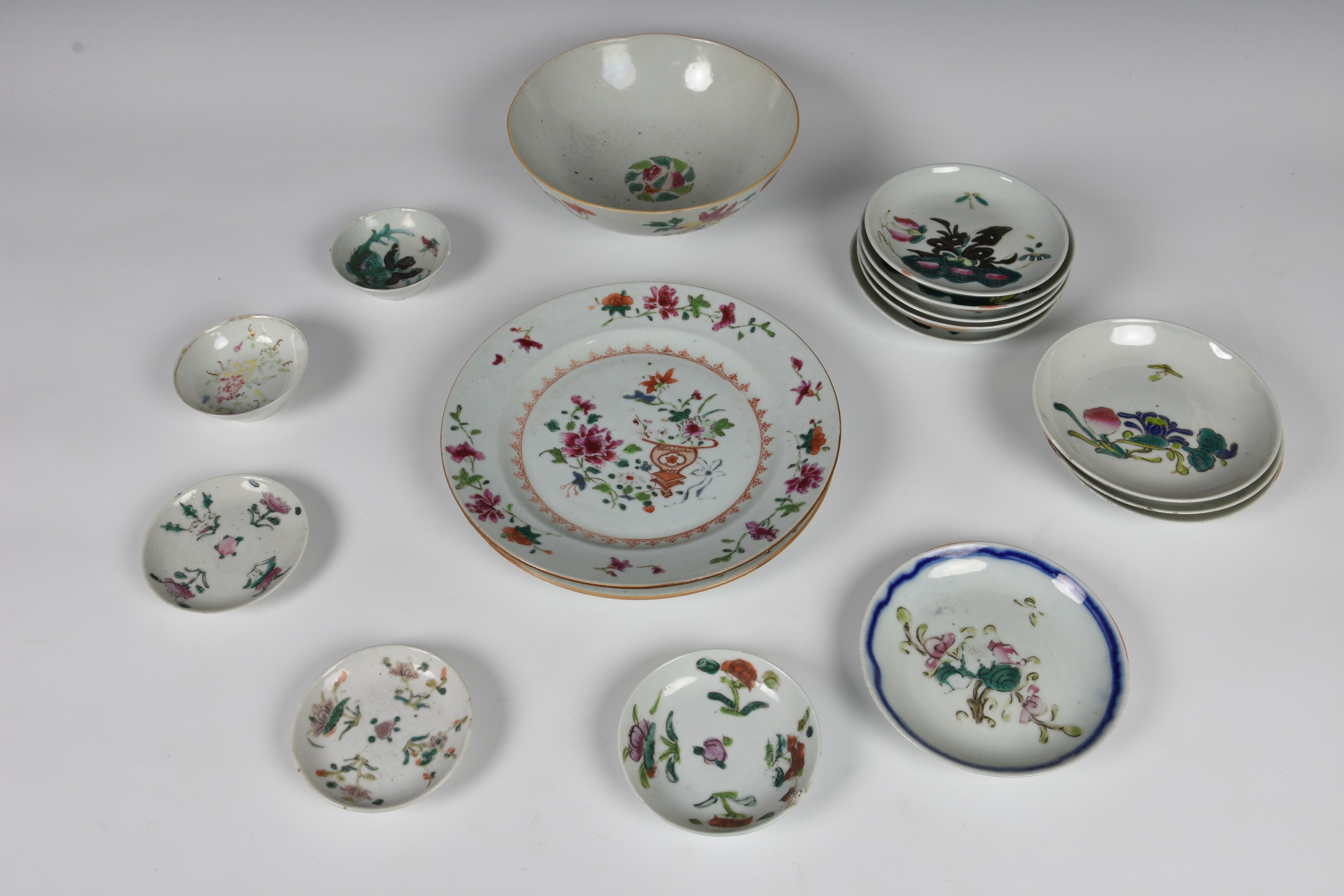 A pair of Chinese export porcelain famille rose plates late 18th century, painted with a