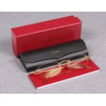 A pair of Cartier gold framed rimless Eye glasses / spectaclesunknown prescription, the bridge