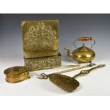 A small collection of antique brasswareto include a brass wall hanging heraldic arms / armorial