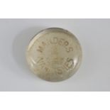 A clear glass advertising paperweight early 20th century, for 'Mander's Varnishes', 8cm.
