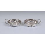 A pair of George V English silver tastevin Levesley Brothers (Thomas Levesley), Sheffield, 1912,