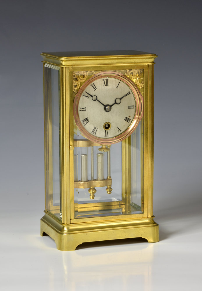 A brass cased four glass mantel clocklate 19th century, possibly American with French single train