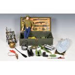 A collection of various accessories for action man to include various guns, rifles, uniforms and