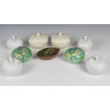 A pair of Chinese famille rose porcelain peach shaped covered boxes late 20th century, the interiors