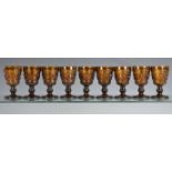 A matched set of nine French burnt orange moulded wine glasses all approx 12.7cm high. (9) *Few