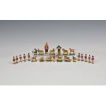 Folk Art - A collection of Erzgebirge miniature turned & painted figures German, first quarter