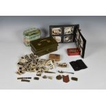 A Rummage box of Military and Guernsey Channel Islands collectables to include a WWI bullet case