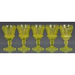A set of five Victorian moulded uranium glass wine goblets in acid yellow uranium glass, 15.9cm.