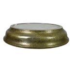 A vintage circular silver plate on planished brass and mirrored wedding cake baseof large