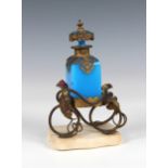 A late 19th century French blue glass, gilt metal and alabaster scent bottle on stand the square