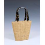 An Elaine Turner Designs woven bucket bag the woven straw bag with baby pink lining with zip top