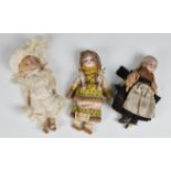 Three small bisque head girl dolls early 20th century, one by Armand Marseille, impressed marks to