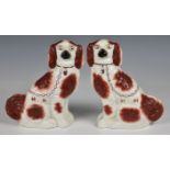 A pair of Staffordshire King Charles spaniels