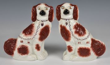 A pair of Staffordshire King Charles spaniels