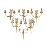 A set of five French gilt bronze two branch wall lights or appliques early 20th century, in the