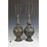 A pair of bronze style ceramic table lamps *Chips to base of both lamps.