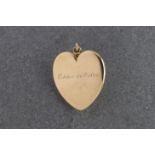 A late 19th century 18ct gold heart pendant locket by Tiffany & Co. the bale stamped 'Tiffany & Co',