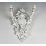 A Continental Rococo revival blanc de chine porcelain wall bracket