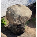 A Guernsey granite mushroom the base approximately 14 inches in height, plus cap of approximately 16