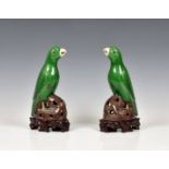 A pair of Chinese porcelain green & purple glazed parrots late 18th century, standing position on