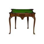 A 19th century walnut card table in the George I style the rectangular top with projecting corners