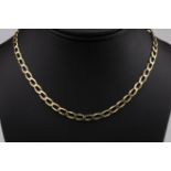 A 9ct gold curb link necklace with lobster claw clasp, British import hallmarks, 16¼in. (41.2cm.)