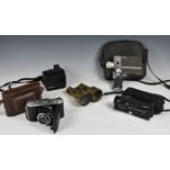 A Canon Auto Zoom 318M Super 8 8mm cine camera with soft case; together with an Ilford Elmo Zoom 8-