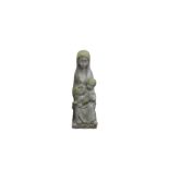 A carved granite figure of a mother and child 26in. (66cm.) high.