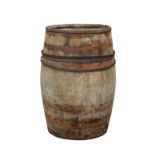 A large wooden barrel with metal banding for 'O & T Bacot, Cognac' app 30in. (76.2cm.) wide,