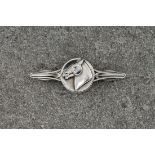 A Georg Jensen silver bar brooch unknown designer, model No. 247, 1915-1927, cast with central