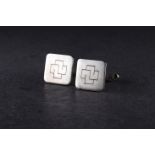 A pair of silver Cuff Links exclusively handcrafted for Credit Suisse by Bruce Russell Guernsey,