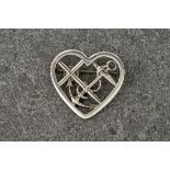 A Georg Jensen silver brooch designed by Vilhelm Albertus model No. 296, c.1945, love heart, pierced