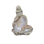 A composite stone figure of a seated ancestor 19½in. (49.5cm.) high.